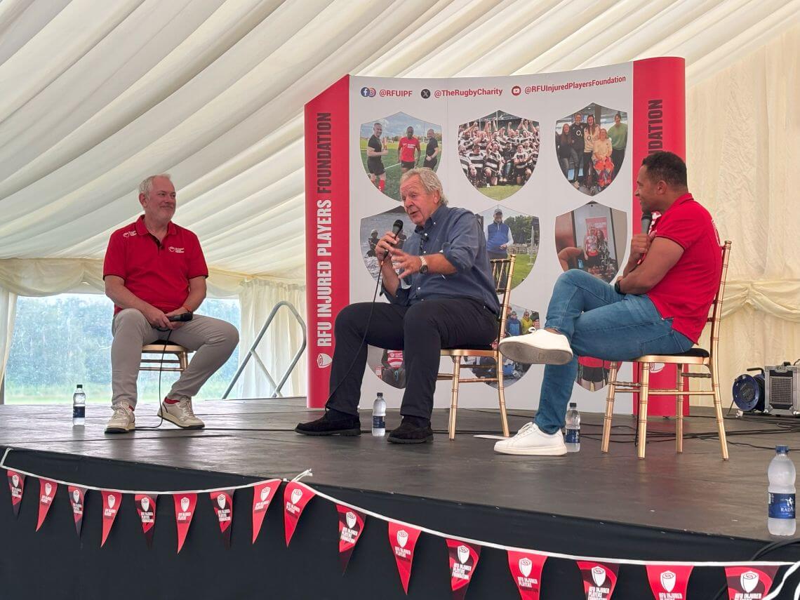 Karen Hood and John Burgess of the IPF, Nick Mullins and IPF Member Alex Bennett on stage