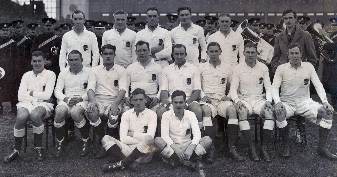 A black and white photo of a rugby team